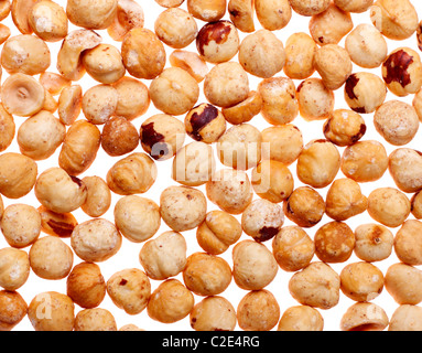 fresh peeled hazelnuts isolated on white background Stock Photo