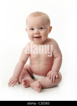 Portrait of an adorable baby sitting up wearing a diaper and smiling, isolated on white Stock Photo