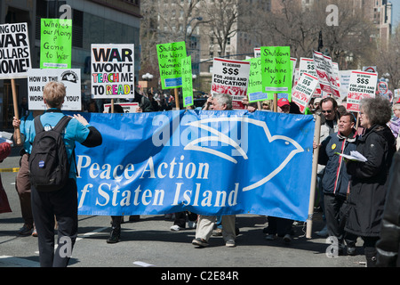 Several thousand peace activists march down Broadway from Union Square in New York Stock Photo