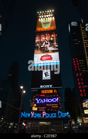 One Time Square electronic billboard building with NYPD booth, Manhattan, New York, USA Stock Photo