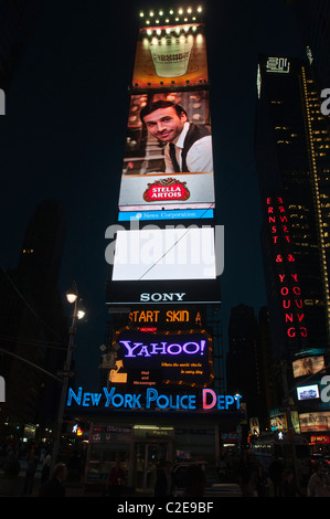 One Time Square electronic billboard building with NYPD booth, Manhattan, New York, USA Stock Photo