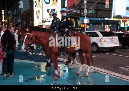 NYPD police officers on horse back in Times Square New York City Stock ...