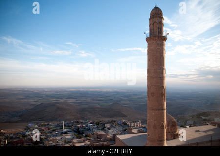 The old 12th century stone minaret of the Great Mosque (Ulu Cami) in the city of Mardin, eastern Anatolia region, southeast Turkey. Stock Photo