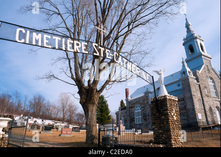 Cemetery and church, Ste-Catherine-de-Hatley, province of Quebec, Canada. Stock Photo