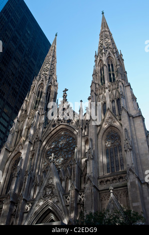 St Patrick's Cathedral on 5th Avenue with blue sky background, Manhattan, New York City, USA Stock Photo