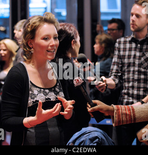 Actress Isabelle Blais being interviewed during the red carpet arrival for a special screening of 'The High Cost of Living'. Stock Photo