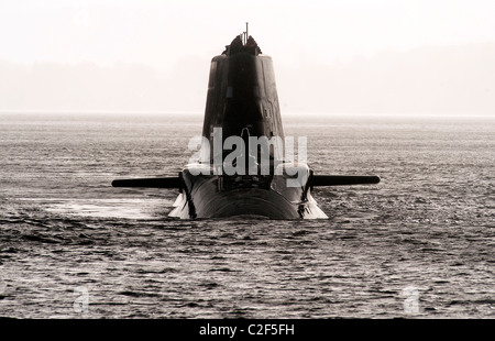 HMS Astute, the Royal Navy's latest nuclear submarine sail up Gareloch on the Firth of Cylde to her new base at HMNB Faslane. Stock Photo