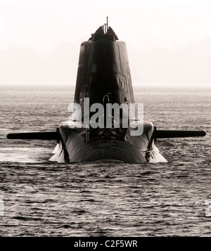 HMS Astute, the Royal Navy's latest nuclear submarine sail up Gareloch on the Firth of Cylde to her new base at HMNB Faslane. Stock Photo