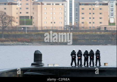 HMS Astute, the Royal Navy's latest nuclear submarine sail up Gareloch on the Firth of Cylde to her new base at HMNB Faslane. Stock Photo