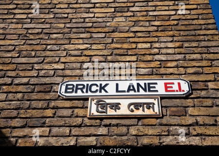 Street name sign and equivalent in Bengali, Brick Lane, London, E1, UK Stock Photo