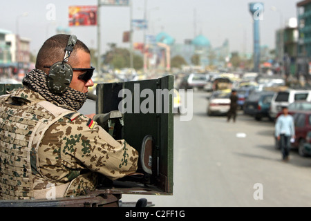 ISAF troops patrolling in a Dingo, Mazar-e Sharif, Afghanistan Stock Photo