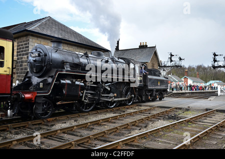 NYMR Engine 76079 entering Grosmont Station to take passengers on to Whitby. Stock Photo