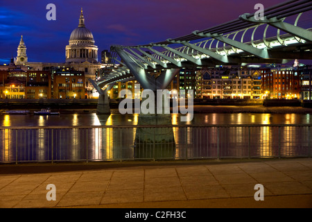 Night view of St. Paul's Cathedral and the Millennium Bridge from the Southbank, London, England, UK Stock Photo