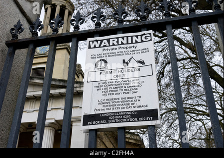 Car clamping area warning sign in London, England, UK Stock Photo