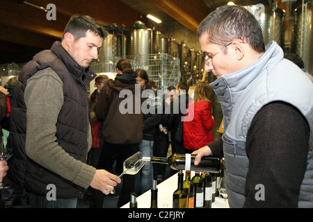 Sommelier pouring out wine at the wine tasting event in Karpatska Perla winery, Slovakia. Stock Photo