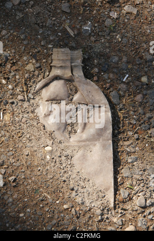 one crushed old plastic water bottle on street road Stock Photo