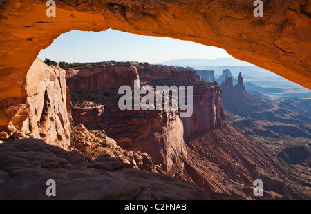 Looking under Mesa Arch toward Washer Woman Arch in Canyonlands National Park, Utah, USA. Stock Photo