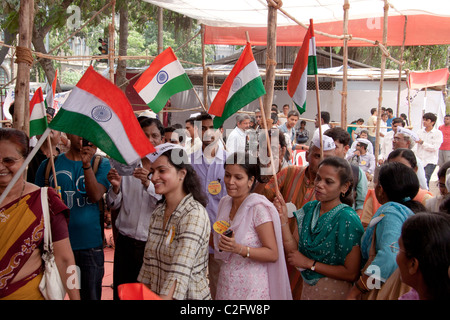 Anna Hazare's anti corruption rally supporters with India’s flag at Azad Maidan in Mumbai (Bombay), Maharashtra, India. Stock Photo