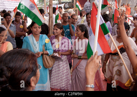 Anna Hazare's anti corruption rally supporters with India’s flag at Azad Maidan in Mumbai (Bombay), Maharashtra, India. Stock Photo