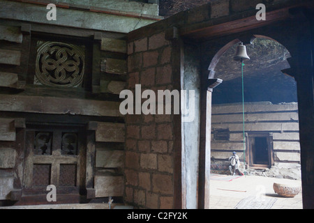 Man inside the cave at Yemrehanna Kristos church outside of Lalibela Stock Photo