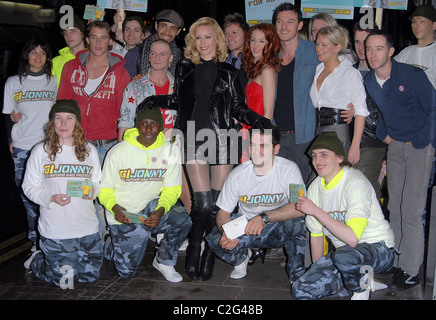 Denise Van Outen and the cast of Rent posing with members of Gi Jonny London, England - 29.11.07 Stock Photo