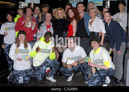 Denise Van Outen and the cast of Rent posing with members of Gi Jonny London, England - 29.11.07 Stock Photo