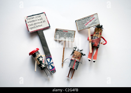 Education cuts protest, models created by schoolchildren with recycled materials. Stock Photo