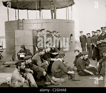 James River, Va. Sailors relaxing on deck of U.S.S. Monitor Stock Photo