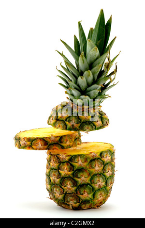 Pineapple with slice floating in the air on white background Stock Photo