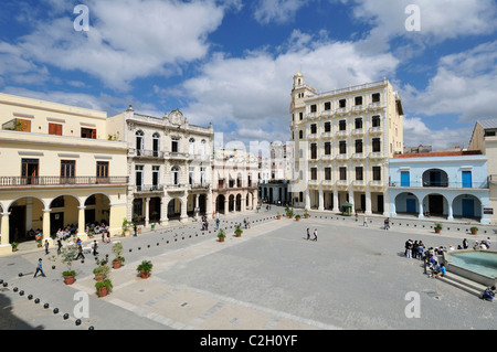 Havana. Cuba. View across Plaza Vieja and the Edificio Gomez Vila (tall building, right), Habana Vieja / Old Havana.