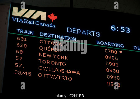 Departure board at Montreal train station. Stock Photo
