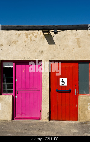 Two brightly painted doors on Margate Jetty.  Photograph by Gordon Scammell Stock Photo