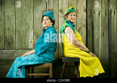 Senior stylish women are dress with a felt clawing. Looking strait to the camera. Stock Photo