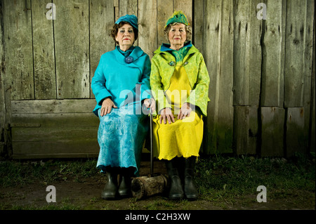Senior stylish women are dress with a felt clawing. Looking strait to the camera. Stock Photo