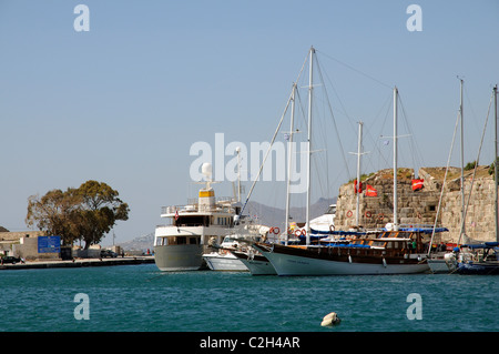 Visiting boats on Kos Town harbour on Kos Island Greece Stock Photo