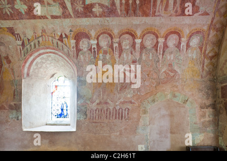 12th century fresco wall painting of six of the twelve apostles in the chancel of St Marys church. Kempley, Gloucestershire UK Stock Photo