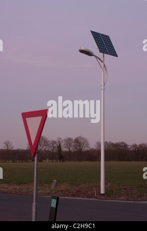 Energy efficient  stand alone Led road lighting turned off with solar panel as power source Stock Photo