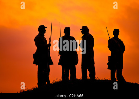Confederate re-enactors at Fort Moultire as the sunrises on the 150th Anniversary of the US Civil war in Charleston, SC. Stock Photo