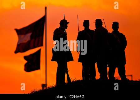 Confederate re-enactors at Fort Moultire as the sunrises on the 150th Anniversary of the US Civil war in Charleston, SC. Stock Photo