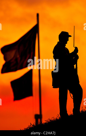 Confederate re-enactor at Fort Moultire as the sunrises on the 150th Anniversary of the US Civil war in Charleston, SC. Stock Photo