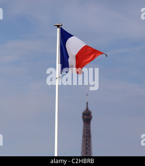 The French flag flies above the stadium at Roland Garros with the Eiffel Tower in the background during the French Open Tennis Stock Photo