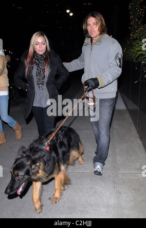 Brandi Cyrus and Billy Ray Cyrus out walking their dog in Midtown New