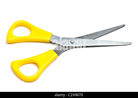 Yellow handled scissors closeup on a white background Stock Photo