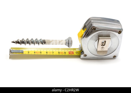 Tape measure and screw isolated on white background Stock Photo