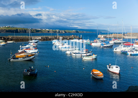 Yachts and fishing boats moored in Portrush Harbour, County Antrim, Northern Ireland. Stock Photo