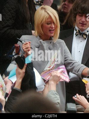 Paris Hilton receiving Harvard Lampoon's 'Woman of the Year' Award outside the Lampoon 'Castle' Cambridge, Massachusetts - Stock Photo