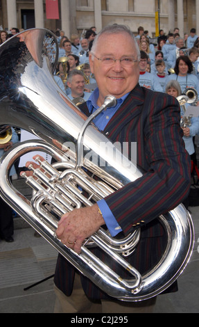 Ian Smith Neighbours' Harold Bishop (Ian Smith) performing with more than 250 nationwide brass band players in London's Stock Photo