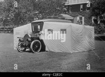 DuPont, Owner of General Motors Introduces Car that Molts into a Camper With Tents Stock Photo