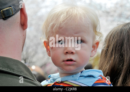 Little blond boy look fixedly, Sakura Sunday spring celebration, Fairmount Park, Philadelphia, Pennsylvania, USA Stock Photo