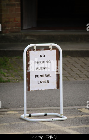 No parking sign outside a church where a funeral is to be taking place Stock Photo